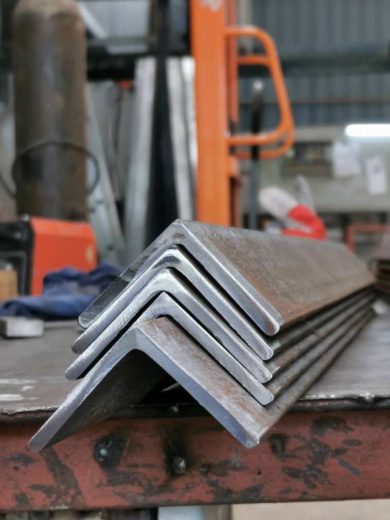 fresh-cut-mild-steel-angle-bar-factory-with-blurry-background-selective-focus.jpg